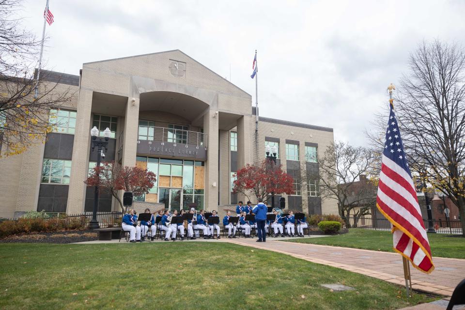 The Ravenna Raven High School band plays on the Portage County Courthouse steps at the Veterans Day remembrance ceremony held on the Portage County Courthouse Lawn Saturday, Nov. 11, 2023.