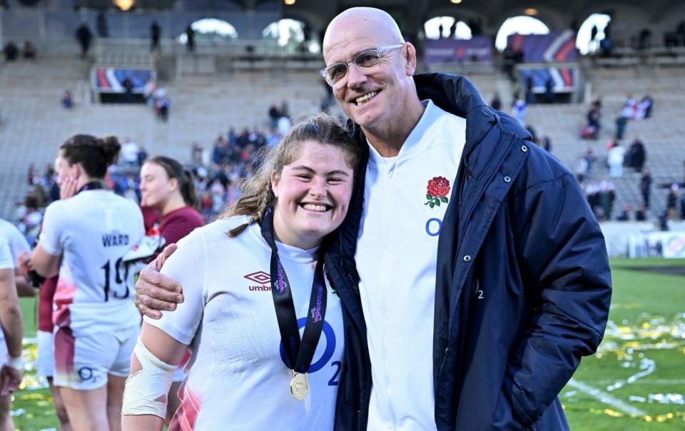 John Mitchell celebrates with Maud Muir