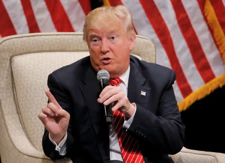 Republican U.S. presidential candidate Donald Trump speaks at a town hall campaign event in Hickory, North Carolina. March 14, 2016. REUTERS/Chris Keane