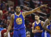 Jan 20, 2017; Houston, TX, USA; Golden State Warriors forward Kevin Durant (35) points during the third quarter against the Houston Rockets at Toyota Center. Mandatory Credit: Troy Taormina-USA TODAY Sports