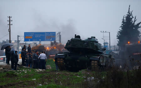 A Turkish military convoy arrives at an army base in the border town of Reyhanli near the Turkish-Syrian border in Hatay province, Turkey January 17, 2018. REUTERS/Osman Orsal