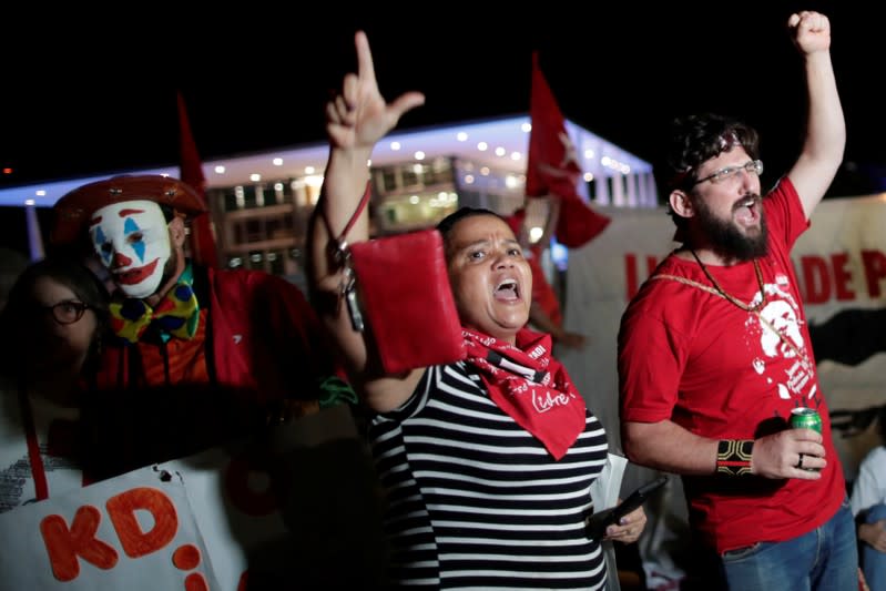 Supporters of Brazil's former president Luiz Inacio Lula da Silva protest outside the Supreme Federal Court in Brasilia