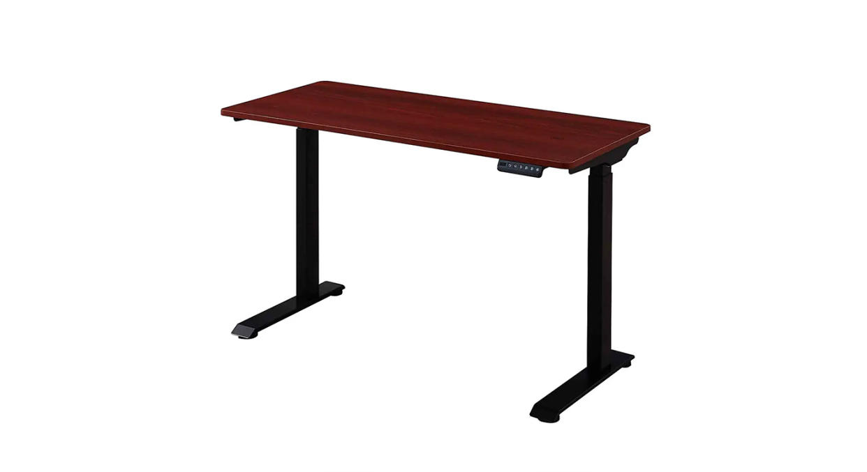 You can seamlessly adjust the height of this electric desk at the touch of a button.