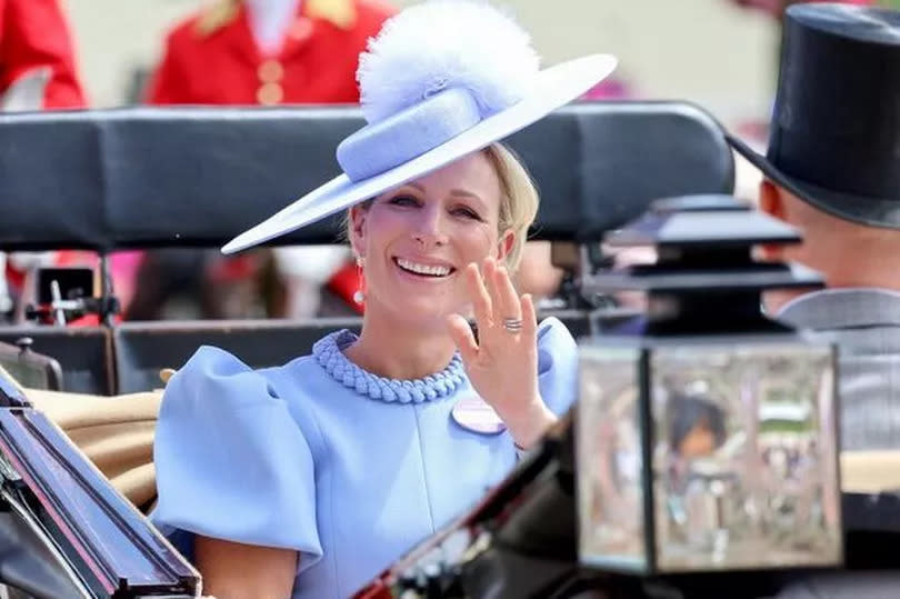 Zara Tindall waves as she attends day three of Royal Ascot 2024 at Ascot Racecourse on June 20, 2024 in Ascot, England