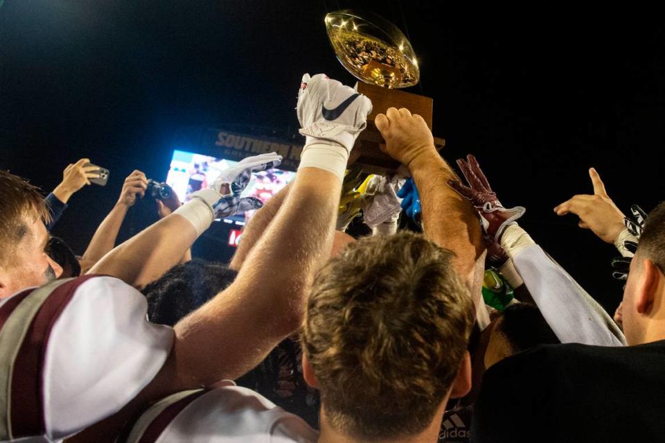 Picayune players celebrate after winning the 5A State Championship at M.M. Roberts Stadium in Hattiesburg on Friday, Dec. 2, 2022.