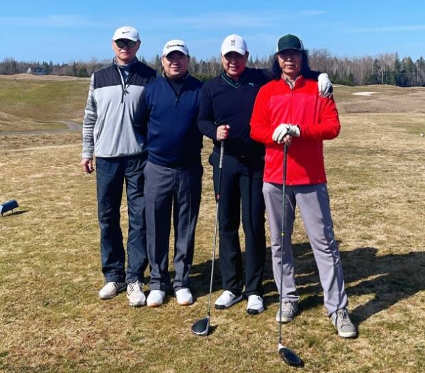 Frank Zhou, second from right, and his golfing buddies Qiang Wei, Mingli Wang and Paul Yin played their first round of the season at Avondale on Friday.