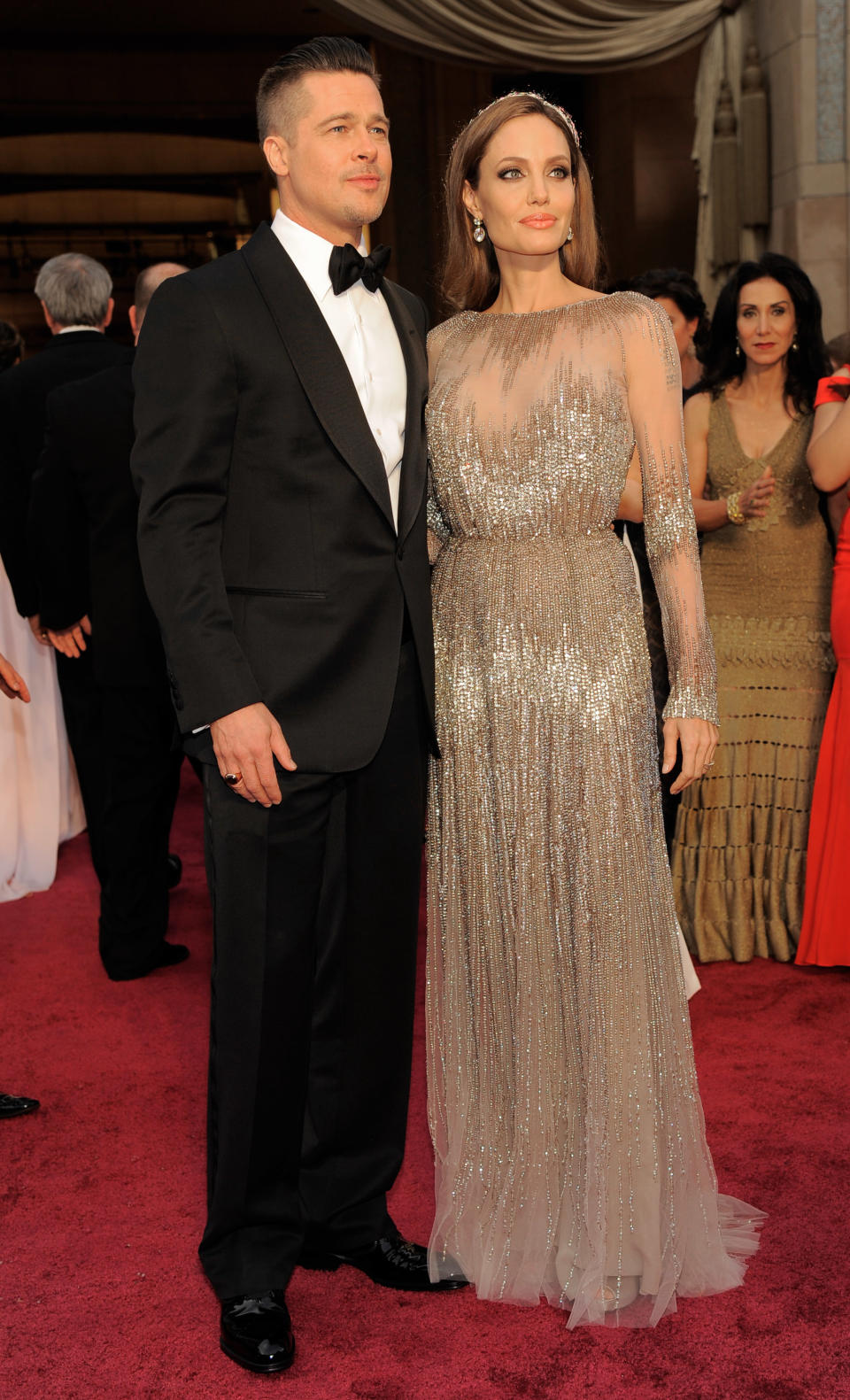 Brad Pitt, left, and Angelina Jolie arrive at the Oscars on Sunday, March 2, 2014, at the Dolby Theatre in Los Angeles. (Photo by Chris Pizzello/Invision/AP)
