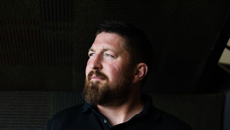 Joshua Riddle, a counselor for the state Office of Rehabilitative Services and a graduate of Utah State University’s rehabilitative counseling program, poses for a portrait at his office in Logan on Thursday, May 18, 2023.