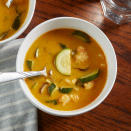 <p>This low-carb vegetable soup is chock-full of veggies swimming in a creamy coconut broth flavored with Thai red curry paste. It's hearty enough to eat on its own, but feel free to add chicken or tofu to boost the protein. <a href="https://www.eatingwell.com/recipe/7873456/low-carb-vegetable-soup/" rel="nofollow noopener" target="_blank" data-ylk="slk:View Recipe" class="link ">View Recipe</a></p>