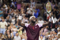 Frances Tiafoe, of the United States, reacts after winning the fourth set against Carlos Alcaraz, of Spain, during the semifinals of the U.S. Open tennis championships, Friday, Sept. 9, 2022, in New York. (AP Photo/Charles Krupa)