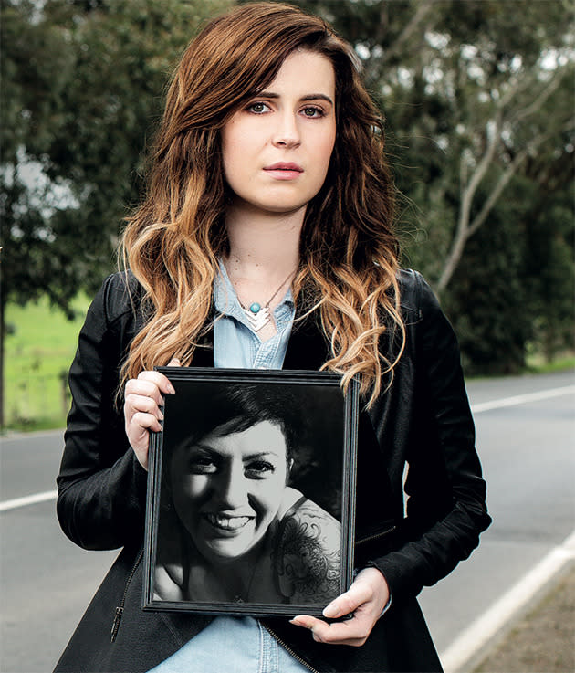 Bella Johnston holds a picture of her best friend, Brooke Richardson, who was killed in a car accident moments after she sent a text while driving near Cobram, Victoria.