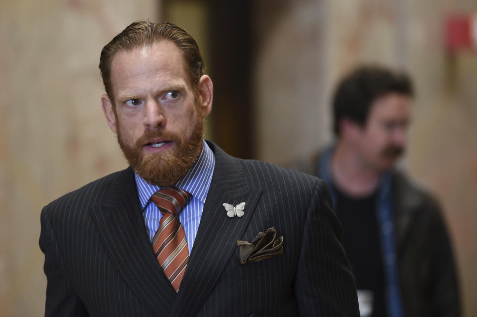 Attorney Curtis Briggs, who represents Max Harris, approaches the media at Alameda County Courthouse in Oakland, Calif., Tuesday April, 30, 2019. Two defendants, Derick Almena and Max Harris are standing trial on charges of involuntary manslaughter after a 2016 fire killed 36 people at a warehouse party they hosted in Oakland. (AP Photo/Cody Glenn)