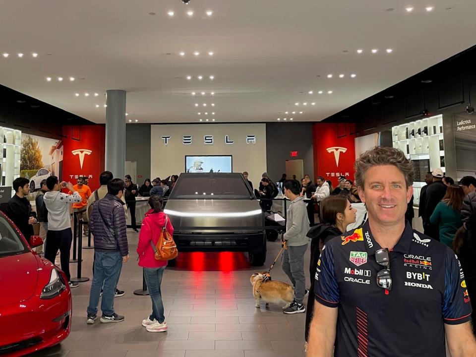 Business Insider Global Tech Editor Alistair Barr stands in a Tesla showroom in San Jose, California, on December 9, 2023.