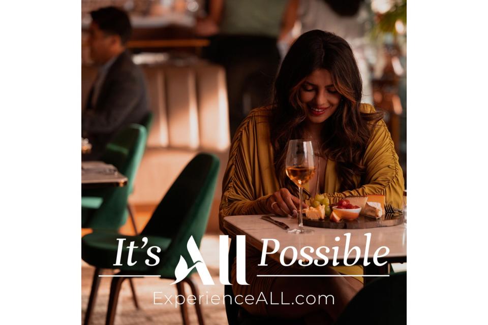 Priyanka dining in the It's All Possible Campaign