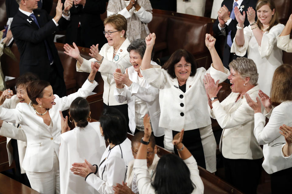 FILE - In this Feb. 5, 2019 file photo, women members of Congress cheer after President Donald Trump acknowledges more women in Congress during his State of the Union address to a joint session of Congress on Capitol Hill in Washington. (AP Photo/J. Scott Applewhite, File)