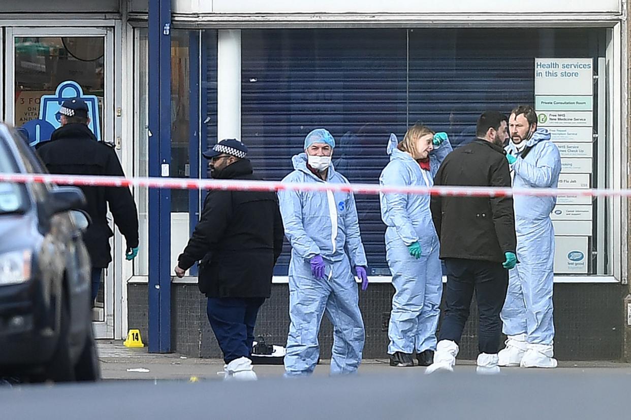 Police forensic officers on Streatham High Road in south London after Sudesh Amman stabbed two bystanders (AFP)