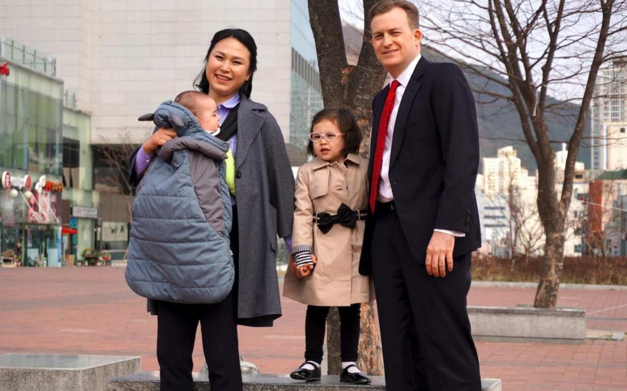 Robert Kelly and Jung-a Kim with their children James and Marion - AFP or licensors