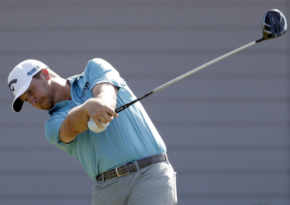 Brice Garnett plays his shot from the first tee during the second round of the Tournament of Champions golf event, Friday, Jan. 4, 2019, at Kapalua Plantation Course in Kapalua, Hawaii. (AP Photo/Matt York)