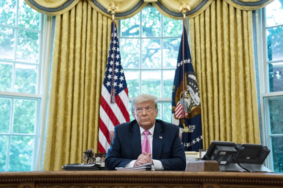 President Trump during a meeting with Senate Majority Leader Mitch McConnell and House Minority Leader Kevin McCarthy in the Oval Office on Monday. (Evan Vucci/AP)