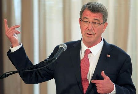 Visiting U.S. Defense Secretary Ash Carter gestures during a joint press conference with his Filipino counterpart Voltaire Gazmin (not pictured) at the presidential palace in Manila April 14, 2016. REUTERS/Romeo Ranoco