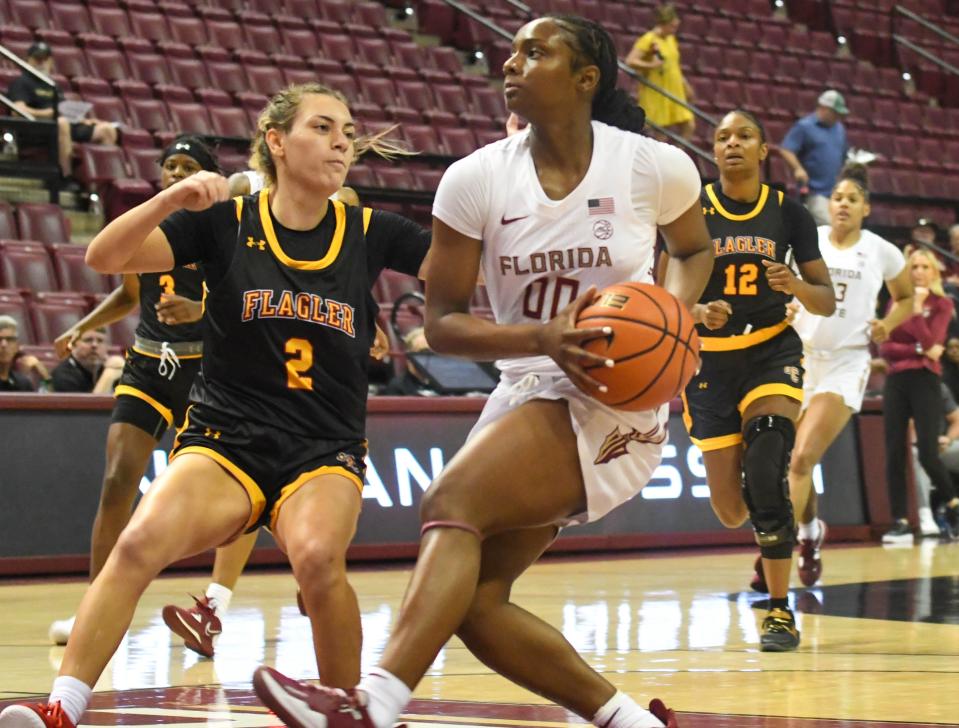 Florida State Seminoles guard Ta'Niyah Latson (00) drives to the hoop against Flagler College's Buse Utko. The Florida State Seminoles hosted the Flagler College Saints for a women's basketball exhibition game at the Tucker Civic Center on Thursday, Nov. 3, 2022.