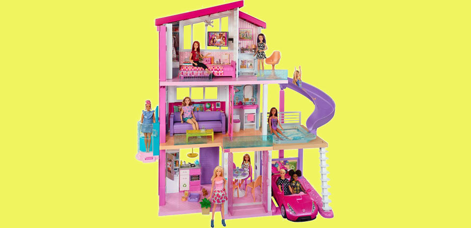 Barbie DreamHouse 2021, with eight dolls inside