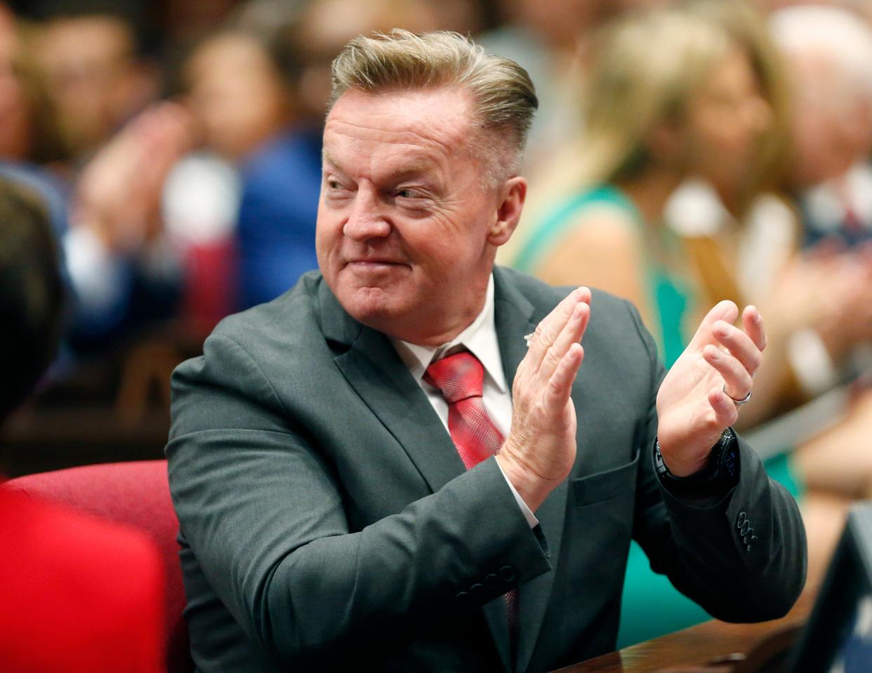 Rep. Anthony Kern, R-Glendale, applauds during Gov. Doug Ducey's State of the State address at the Arizona State Capitol Jan. 13, 2020.