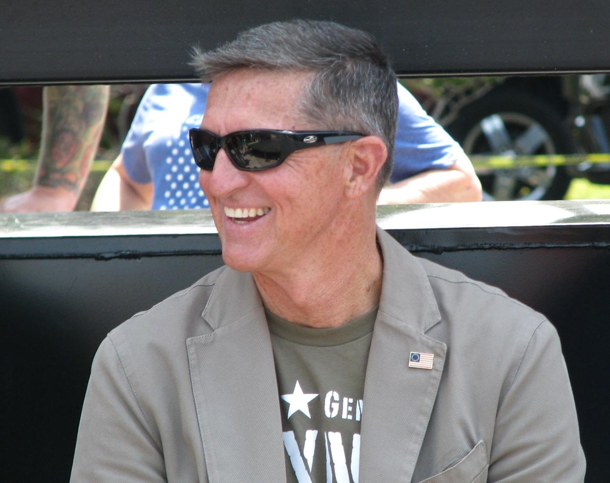 Michael Flynn, former President Donald Trump’s first national security adviser, waits to speak April 24 at the “Save America” rally at the DeSoto Square Mall in Bradenton.