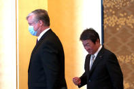 U.S. Deputy Secretary of State Stephen Biegun, left, and Japan's Foreign Minister Toshimitsu Motegi arrive to attend their bilateral meeting in Tokyo Friday, July 10, 2020. (Behrouz Mehri/Pool Photo via AP)