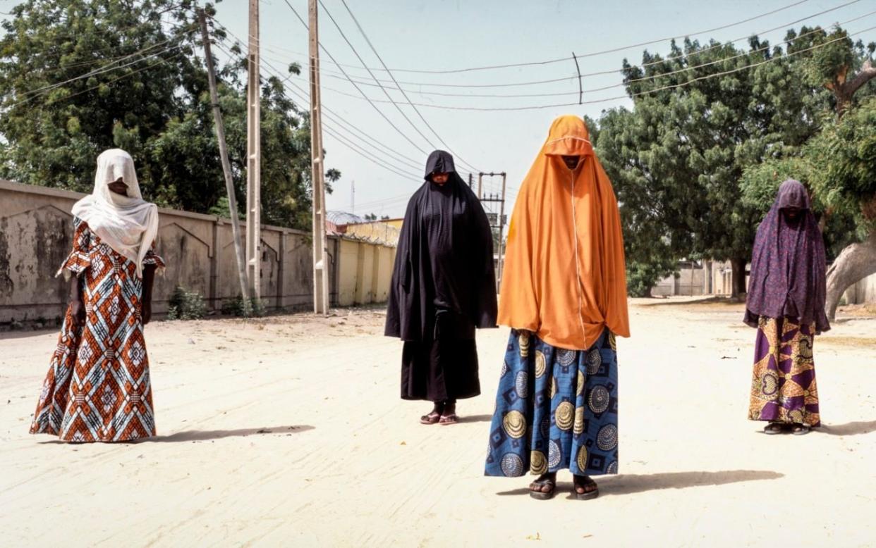 Children who were all abducted by Boko Haram. They were forced to watch and participate in executions and fighting - Simon Townsley/The Telegraph