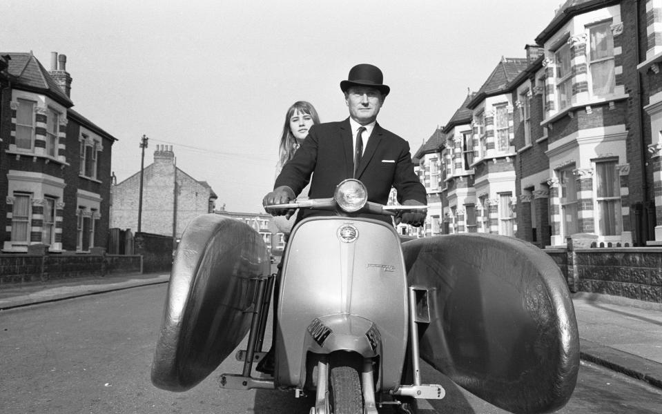 Water scootering back to the office after lunch? It was 'skipper' businessman Jack Hornsby, with his 17 year old daughter Stella seen here before sailing pillion, during a try out on the River Thames. It is an amphibious motor scooter fitted with two floats which are let down before entering the water. A paddle fixed to the back wheel, and it is steered by a rudder controlled by the handlebars 20th October 1965 U9429 . (Photo by George Greenwell/Mirrorpix/Getty Images) - Getty