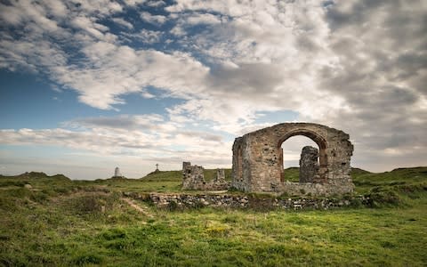 The ruins of St Dwynwen's Church stand on Llanddwyn - Credit: getty