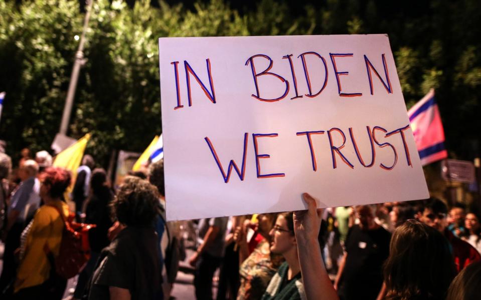 Protesters marched in Tel Aviv on Saturday, calling for an end to the fighting and support for Joe Biden's deal.