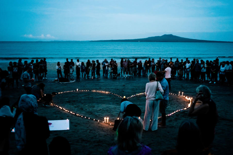 Crowds gather on Takapuna beach for a vigil in memory of the victims of the Christchurch mosque terror attacks, Auckland, New Zealand, March 16, 2019.