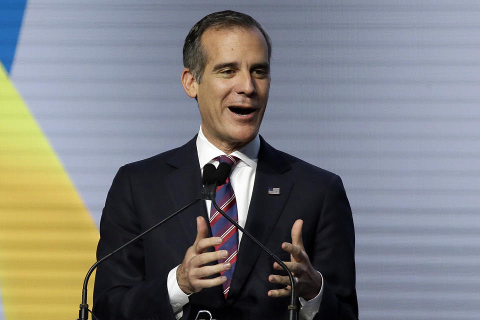 FILE - In this Sept. 14, 2018, file photo Los Angeles Mayor Eric Garcetti addresses the Global Action Climate Summit in San Francisco. A Los Angeles teachers strike is highlighting political risks for Garcetti as he ponders a run for president. Television images showing streets teeming with shouting picketers while half-a-million students are left in limbo aren’t the kind of publicity he needs to launch a White House run. (AP Photo/Eric Risberg)