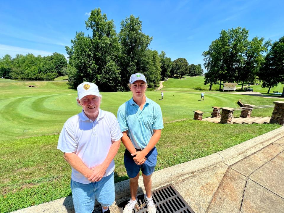 Barek Cardell and Steve Hamrick practice at Deer Brooke Golf Course.