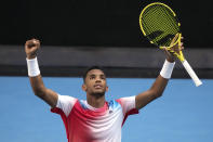 Felix Auger-Aliassime of Canada celebrates after defeating Marin Cilic of Croatia in their fourth round match at the Australian Open tennis championships in Melbourne, Australia, Monday, Jan. 24, 2022. (AP Photo/Simon Baker)