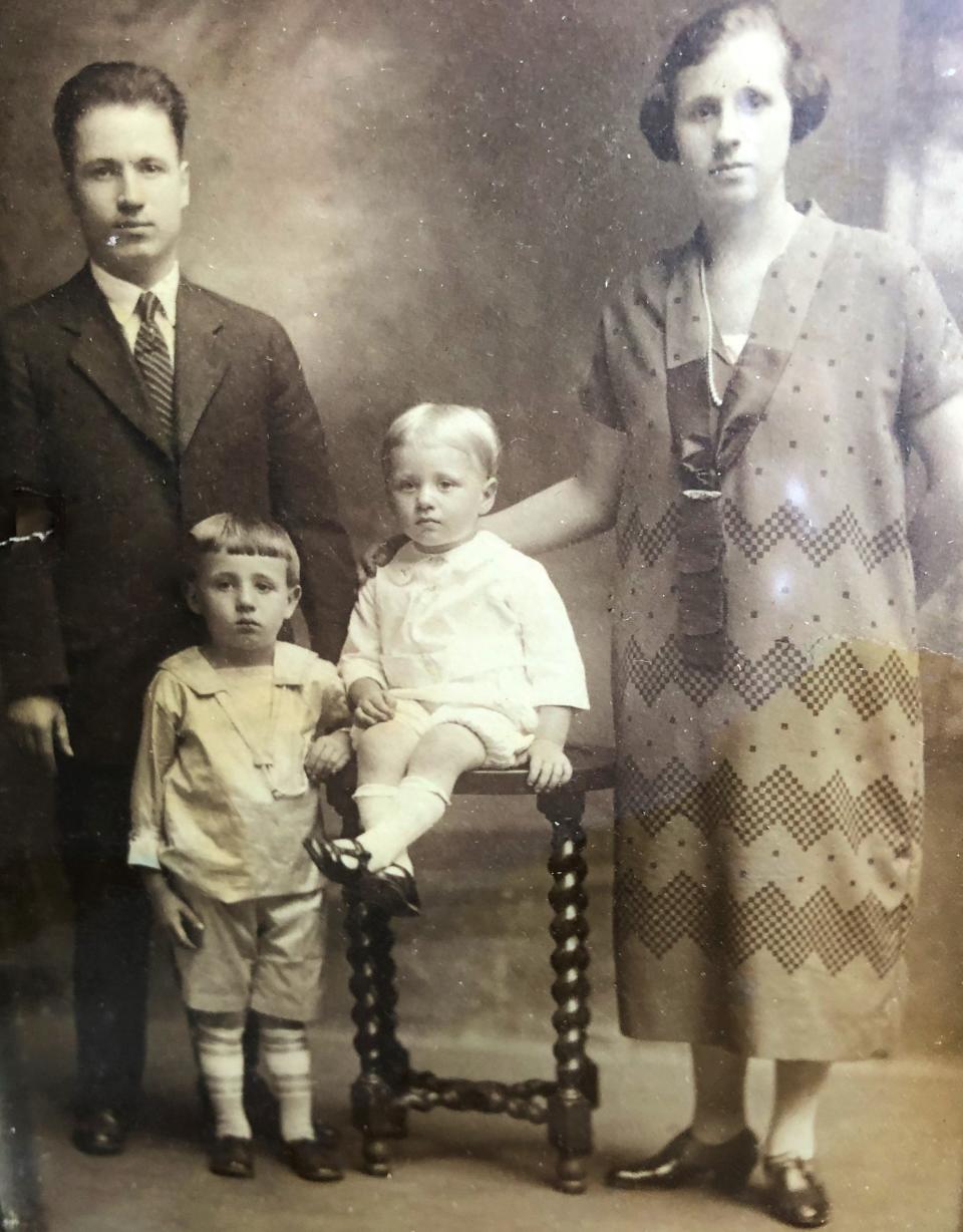 Amelian "Pat" Pastuszak, second from left, and his brother Walter with their parents, Max and Mary, circa 1923.