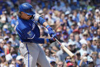 Kansas City Royals' Bobby Witt Jr., hits a single during the first inning of a baseball game against the Chicago Cubs in Chicago, Sunday, Aug. 20, 2023. (AP Photo/Nam Y. Huh)