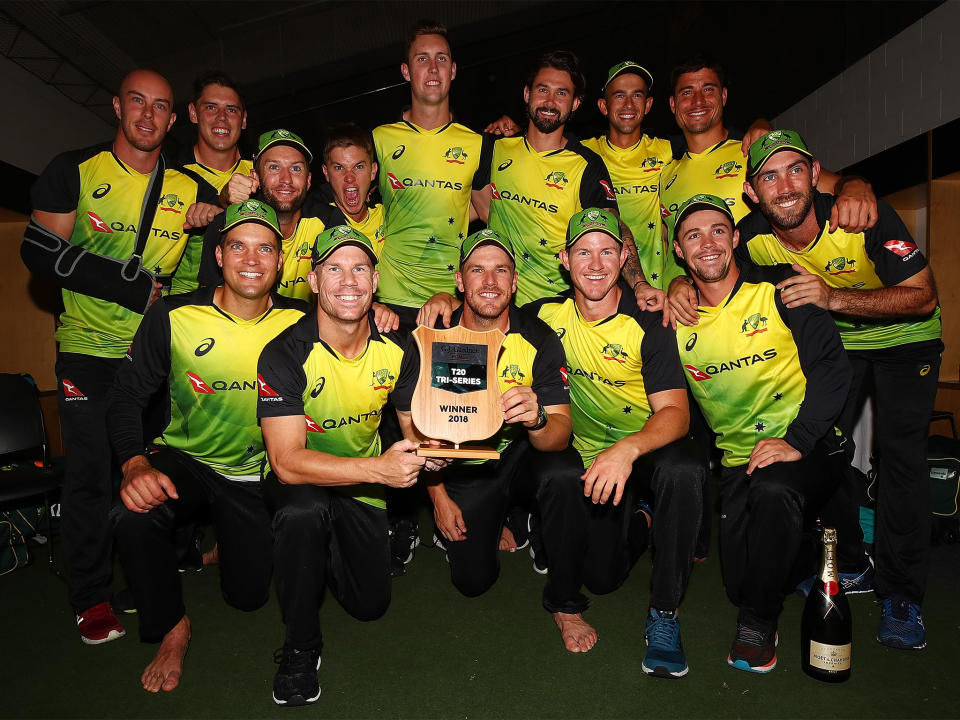 Australia celebrate their victory away from the rain: Getty