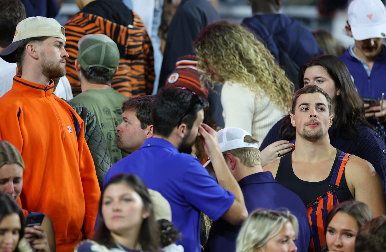 AUBURN, ALABAMA - NOVEMBER 25:  Auburn Tigers fans react after their 27-24 loss to the Alabama Crimson Tide at Jordan-Hare Stadium on November 25, 2023 in Auburn, Alabama. (Photo by Kevin C. Cox/Getty Images)