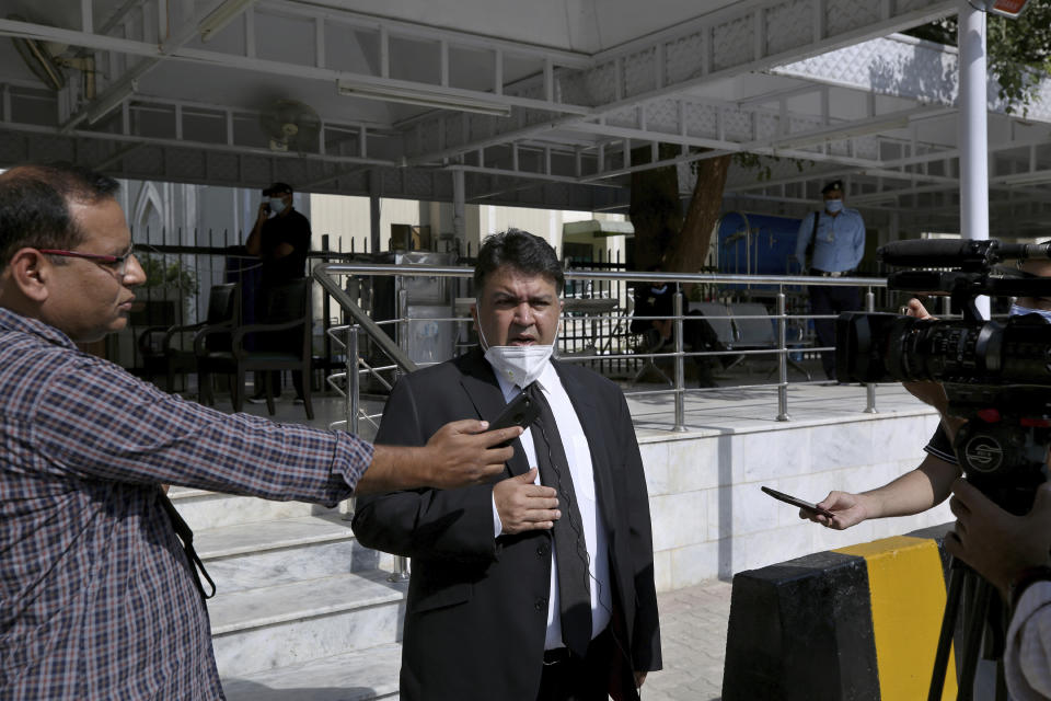 Faisal Siddiqi, a lawyer for the family of Daniel Pearl, an American reporter who was kidnapped and killed in Pakistan, talks to media outside the Supreme Court after an appeal hearing in the case in Islamabad, in Islamabad, Pakistan, Wednesday, Oct. 7, 2020. Ahmed Omar Saeed Sheikh, who has been on death row over the 2002 killing of U.S. journalist Daniel Pearl, will remain in jail for another three months under a government order, a prosecutor told the country's top court Wednesday, as it took up appeals of Pearl’s family and government against acquittal of all accused of murder charges by another court. (AP Photo/Anjum Naveed)