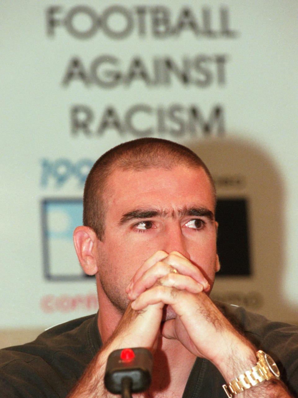 Former Manchester United striker Eric Cantona of France holds a press conference in Madrid Monday September 8, 1997 to announce the upcomming soccer match in Madrid against racism in football. Soccer players from all quarters of the globe will participate in a football match against racism in Madrid October 12, 1997. (AP Photo/Denis Doyle)