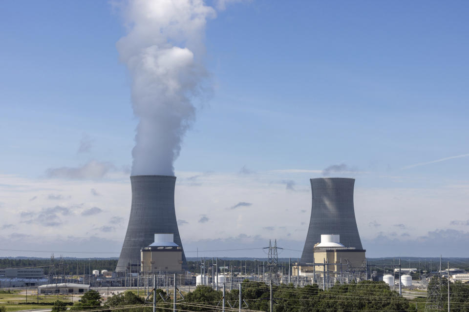 Views of Units 3, from left, and 4 at Plant Vogtle, in Burke County near Waynesboro, Ga., on Monday, July 31, 2023. Georgia Power Co. announced Monday that Unit 3 at Plant Vogtle, southeast of Augusta, has completed testing and is now in commercial operation, seven years late and $17 billion over budget. (Arvin Temkar/Atlanta Journal-Constitution via AP)