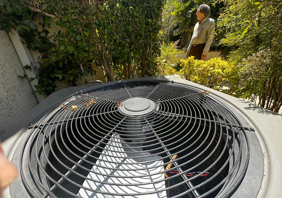 Keep debris and vegetation at least three feet away from your air conditioning unit.