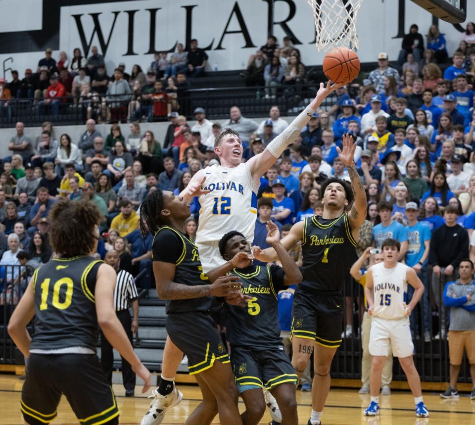 Bolivar’s Kyle Pock attempts to put up a shot against three Parkview defenders during district play at Willard High School on March 3, 2022.