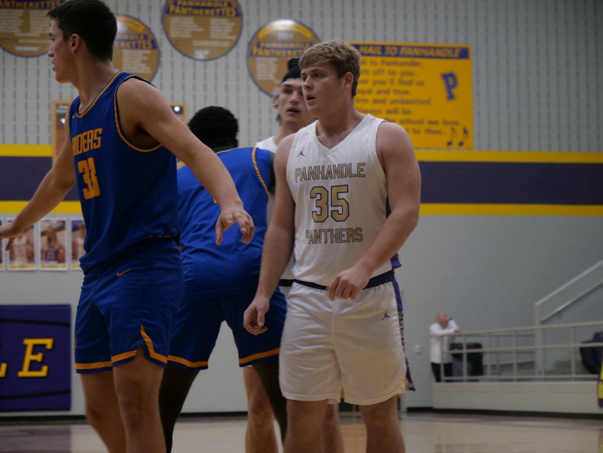 Panhandle's Korbin Preston (35) and Boys Ranch's Grant Blackwell (33) prepare for the inbound pass during a game on Friday, January 27, 2023 at Panhandle High School.