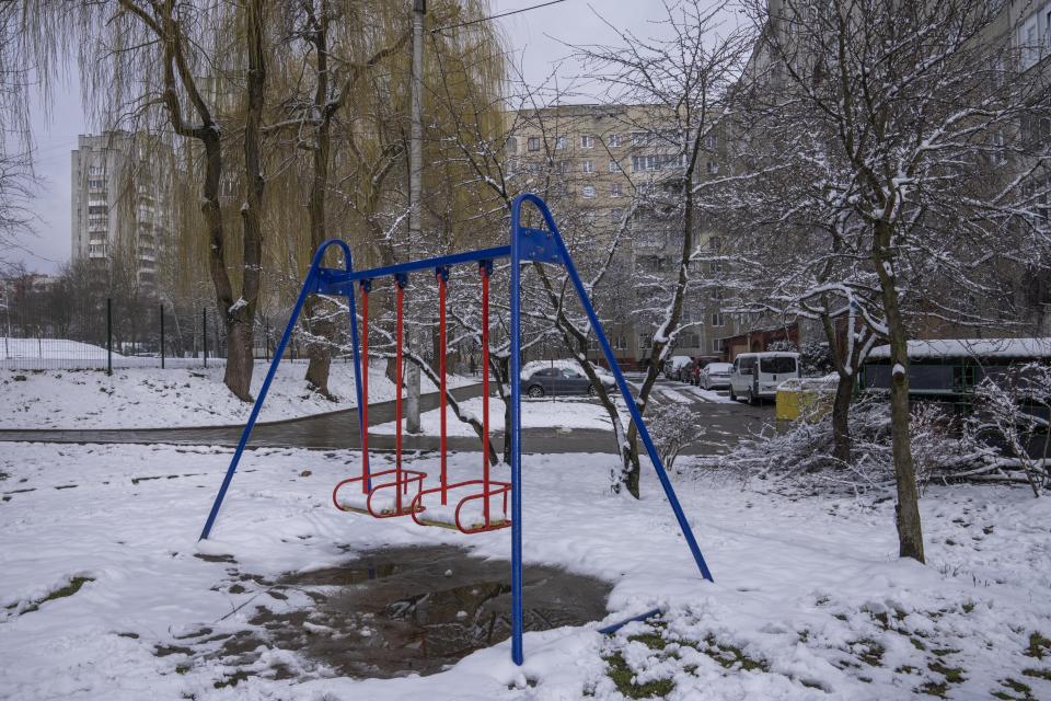 A play ground in front of an apartment building that holds families from some of Ukraine's most devastated communities: bombarded Karkhiv near the Russian border, obliterated Irpin, and Kyiv, the capital itself, in Lviv, western Ukraine, Sunday, April 3, 2022. Lviv on the surface looks calm, but the city is uniquely representative of the 6 million people displaced inside Ukraine since Russia's invasion. (AP Photo/Nariman El-Mofty)