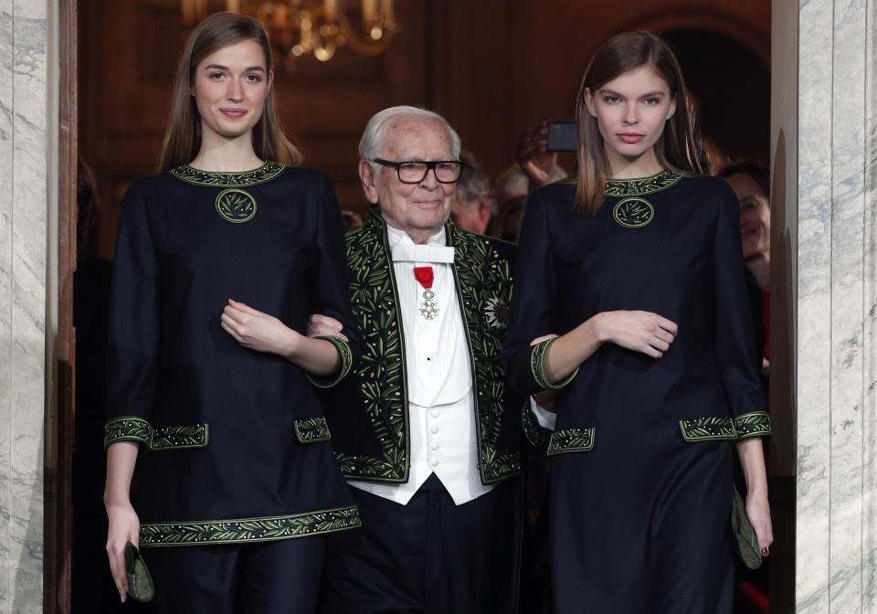 FILE - In this Nov.30, 2016 file photo, French fashion designer Pierre Cardin acknowledges applause after a show to mark 70 years of his creations, in Paris. France's Academy of Fine Arts says Pierre Cardin, the French designer whose Space Age style was among the iconic looks of 20th-century fashion, has died at 98. (AP Photo/Christophe Ena, File)