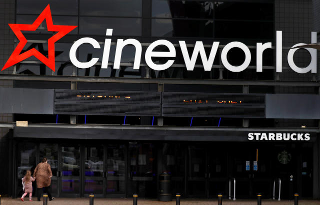 People enter a Cineworld cinema following the outbreak of the coronavirus disease (COVID-19) near Manchester, Britain, October 4, 2020. REUTERS/Phil Noble